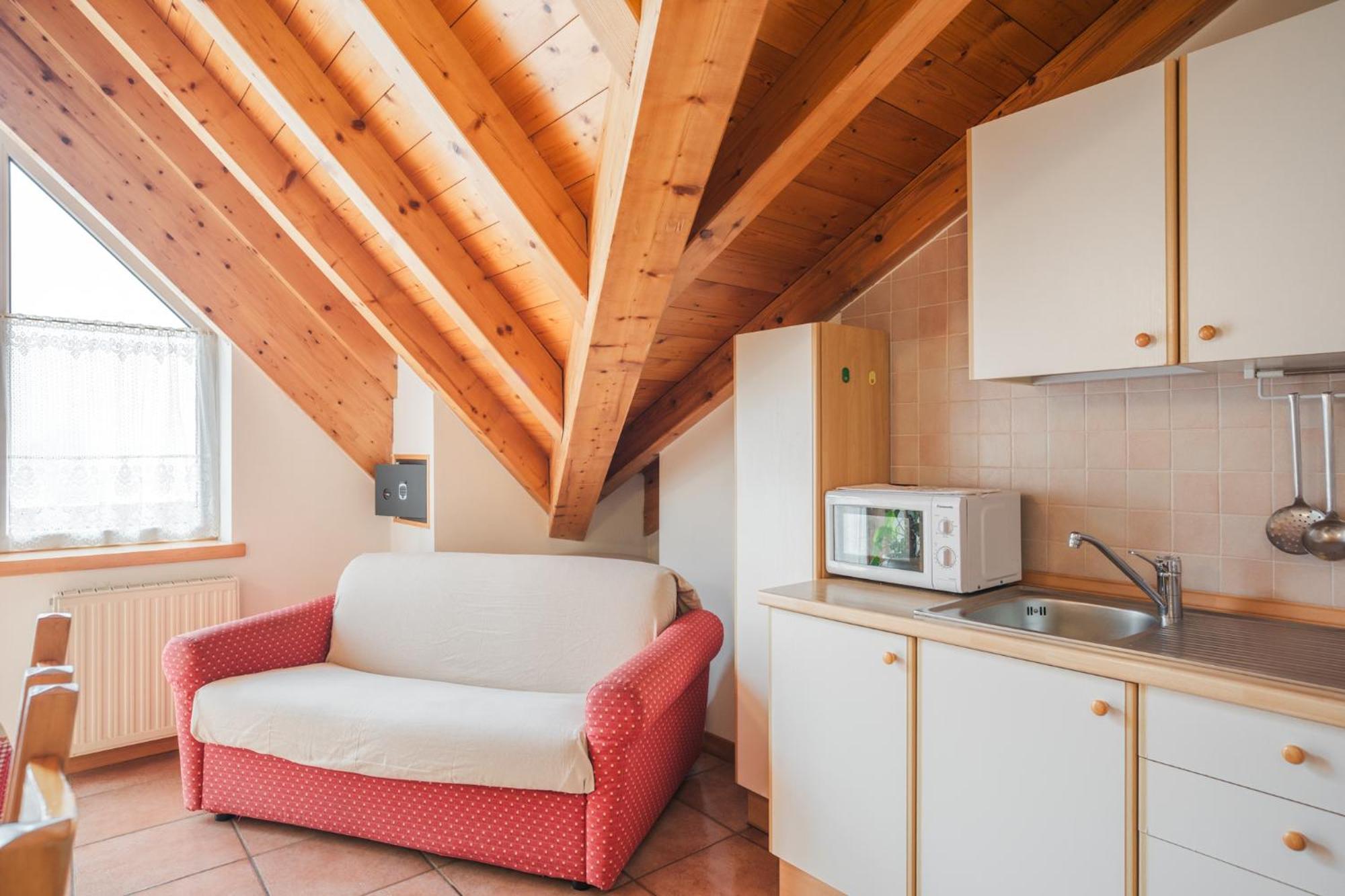 Residence Al Caminetto Molveno Bagian luar foto
