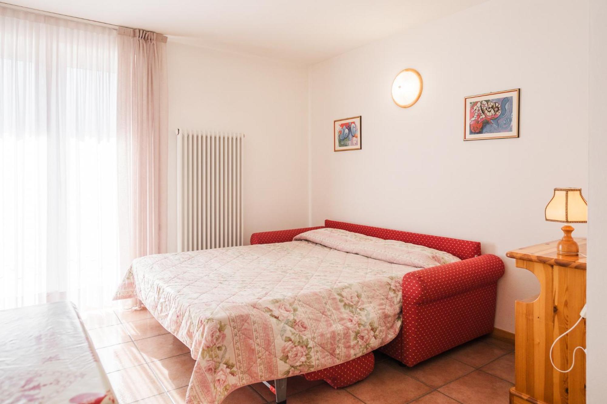 Residence Al Caminetto Molveno Bagian luar foto